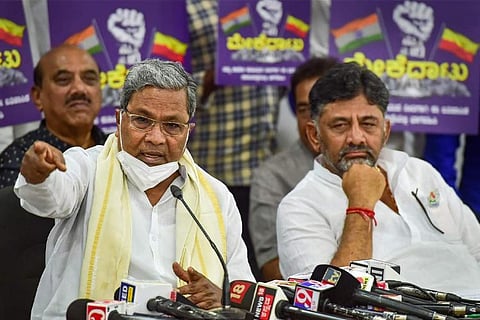 Siddharamaiah and DK Shivakumar at a press conference