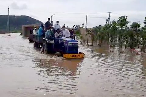 The Collector being brought out of the collectorate on a tractor