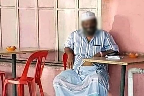 The viral image of Ahmed at his restaurant in Malaysia