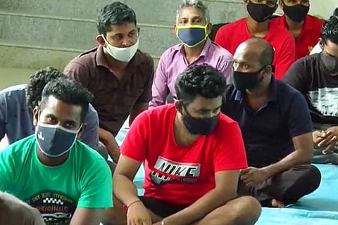 the people sitting in rows