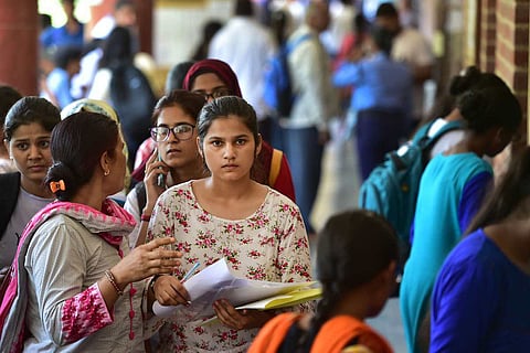 Students filing for college admissions