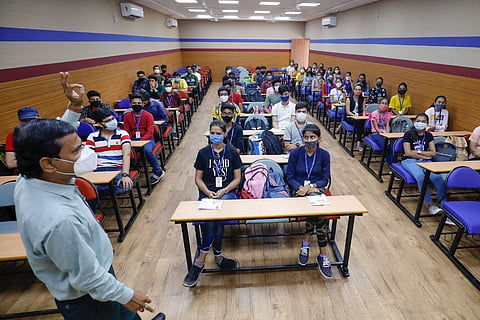 Students and lecturer in a classroom