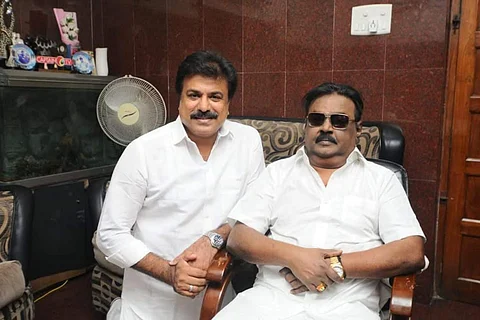 DMDK chief Vijayakanth along with party's deputy general secretary and his brother-in-law LK Sudhish