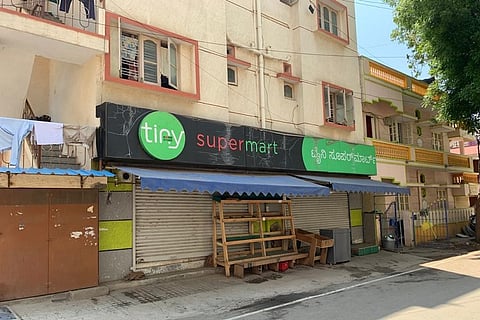 In many Bengaluru areas, police force grocery stores, water supply units to shut