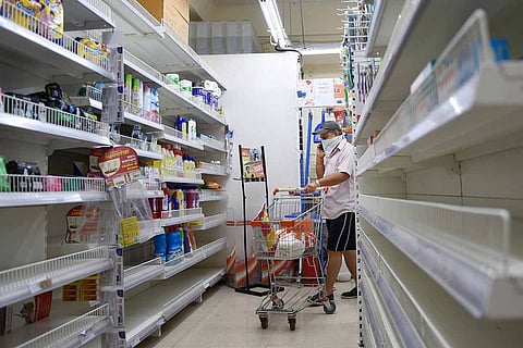 Man shopping in a supermarket