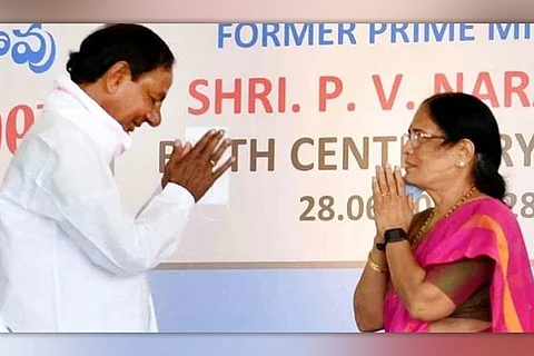 Surbhi Vani Devi with folder hands greeting CM KCR