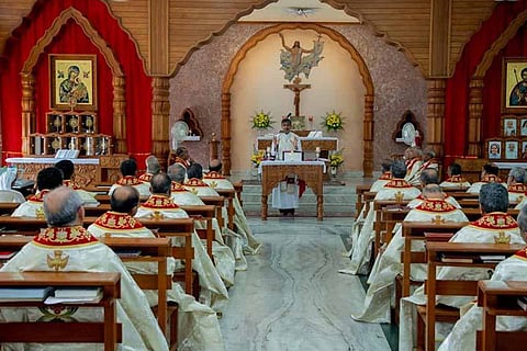 Syro Malabar church hall with priests sitting in it