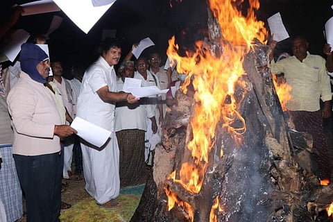 TDP activists burns GOs in Bhogi fire