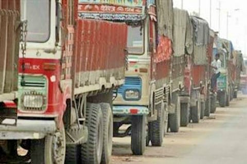 Truckers' strike over various demands including GST, halts goods movement across Karnataka