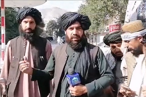 Taliban official speaking to the media in Kabul