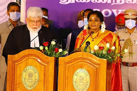 Tamilisai Soundararajan, dressed in an orange saree, swearing in as the Puducherry Lt Governor