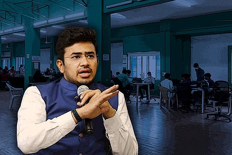 BJP MP Tejasvi Surya is seen wearing a white shirt and blue overcoat