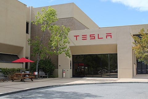 Tesla posts massive loss of $702 million in last quarter due to delivery challenges