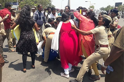 Trans activists being manhandled by police