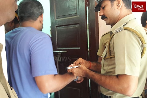 A police officer unlocking handcuff of an accused in actor assault case