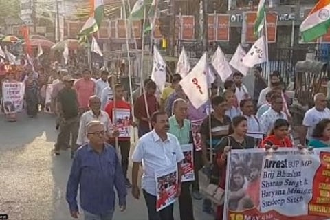 CPI(M) workers took out a protest rally in Agartala