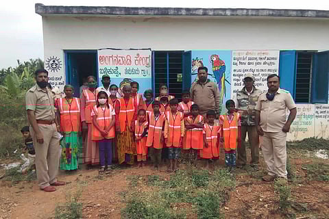 Tumakuru villagers with reflective jackets