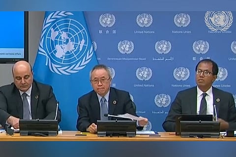 At the release of the United Nations World Economic Situation and Prospects (WESP) report are, from left, Shantanu Mukherjee, Director of the Economic Analysis and Policy Division, r., UN Under-Secretary-General for Economic and Social Affairs Li Junhua, and Hamid Rashid, Chief of the Global Economic Monitoring Branch.