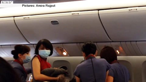 Video: Woman delivers baby on flight and cheering follows