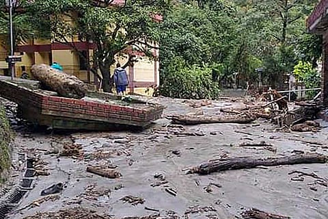 A wall which collapsed due to the rain
