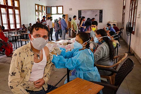 India Vaccination Drive: A beneficiary receives a dose of Covid-19 vaccine at a vaccination centre