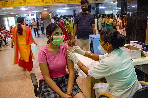 Woman getting vaccinated
