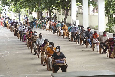 Beneficiaries wait to receive the COVID-19 vaccine dose at a vaccination camp at Vetoornimadam Saint Alozhious school, in Kanyakumari, Saturday, May 29, 2021.