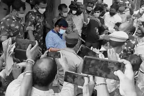 Vanama Raghavendra Rao being accompanied by the police