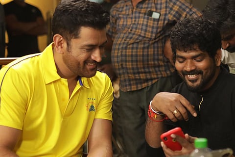 Director Vignesh Shivan and cricketer MS Dhoni,
