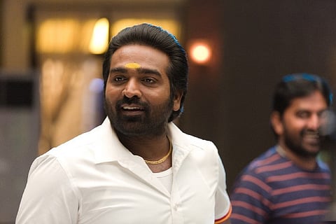 Vijay Sethupathi wearing a white shirt