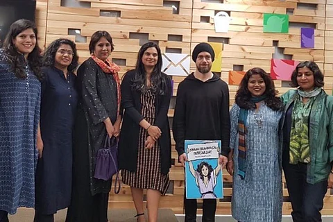 Image from 2018 where Vijaya Gadde can be seen alongside Twitter founder Jack Dorsey, who is holding the smash brahmanical patriarchy placard
