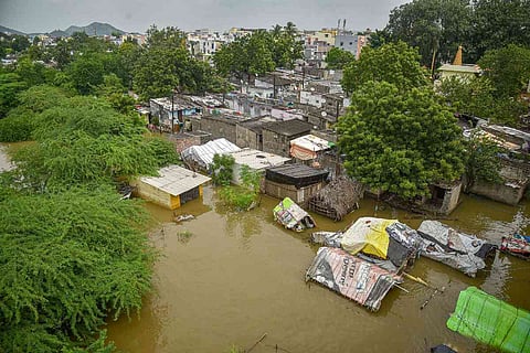Houses submerged in Vijayawada after release of surplus water from Prakasam Barrage into Krishna river in 2020