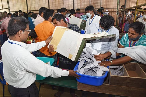 Officials counting municipal election votes at Loyola college in Vijayawada