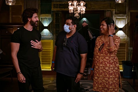 Director duo pushkar and Gayathri along with actor Hrithik Roshan in the sets of Vikram Vedha's Bollywood remake