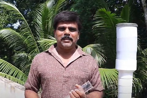 Kerala Man who has set up a rain gauge