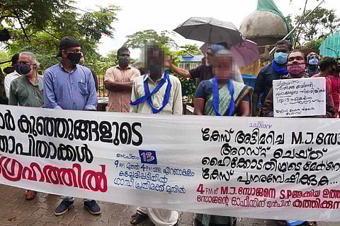 Parents of Walayar sisters during the protest