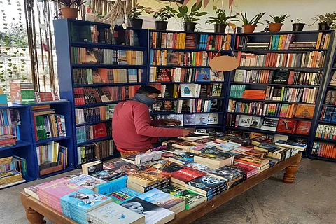 A reader at Bengaluru's pop-up store of Walking Book Fairs