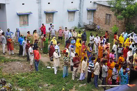 People in West Bengal queue to cast their vote in the fourth phase of polling