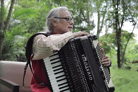 Accordionist MB Prakash in a still from the documentary Whispering Melodies