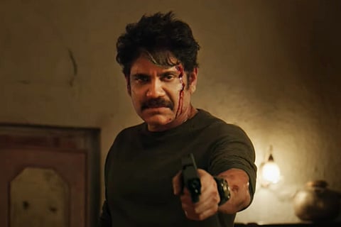 Nagarjuna is seen holding a gun and bleeding. He essays the role of an NIA officer.