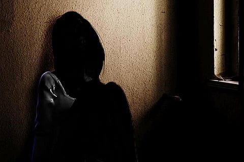 Representative image of woman confined in room