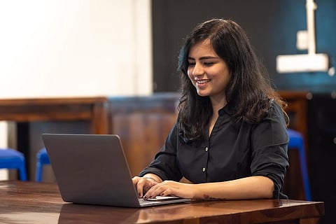 Woman working on laptop