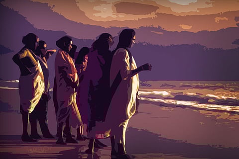 Stylized image of a small group of women, in different attires like saree and salwar, on a beach looking to the sea