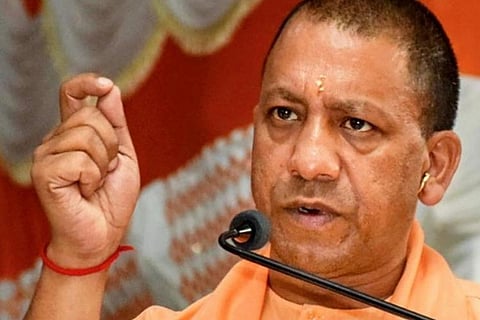 UP CM Yogi Adityanath addressing a conference