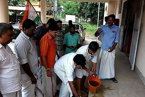 Kerala Youth Cong sprinkles cow dung water to 'clean' venue where Dalit MLA protested