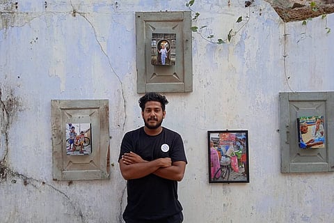 Zalman with his photographs