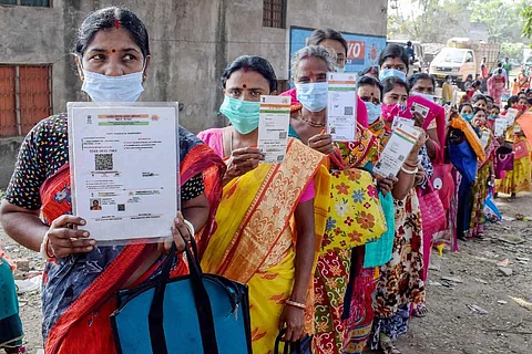 women voters in a line