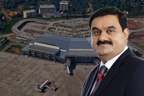 An image of Gautam Adani with the Mangalore airport in the background