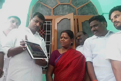 Door-to-door campaign for digital era: AIADMK cadres use iPads for poll campaign