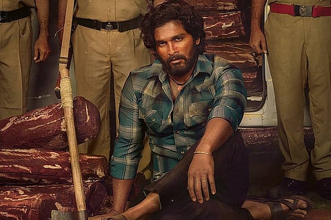 Allu Arjun on the poster for Pushpa